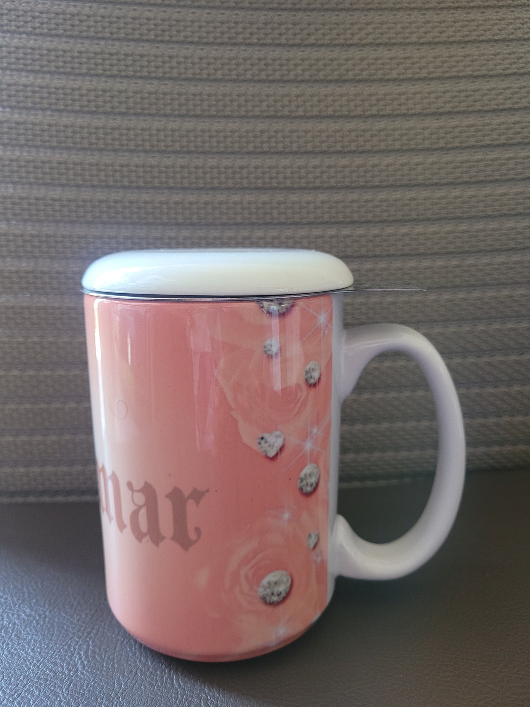 Tea cup with infuser and lid